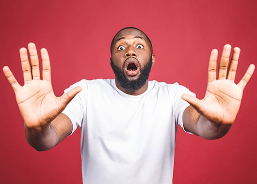 man alerting people to scam and red flags