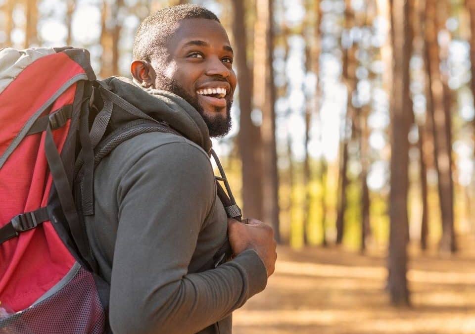 man feeling energetic while climbing after taking cbd oil