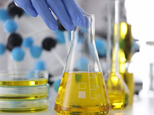 flask with extracted cbd oil