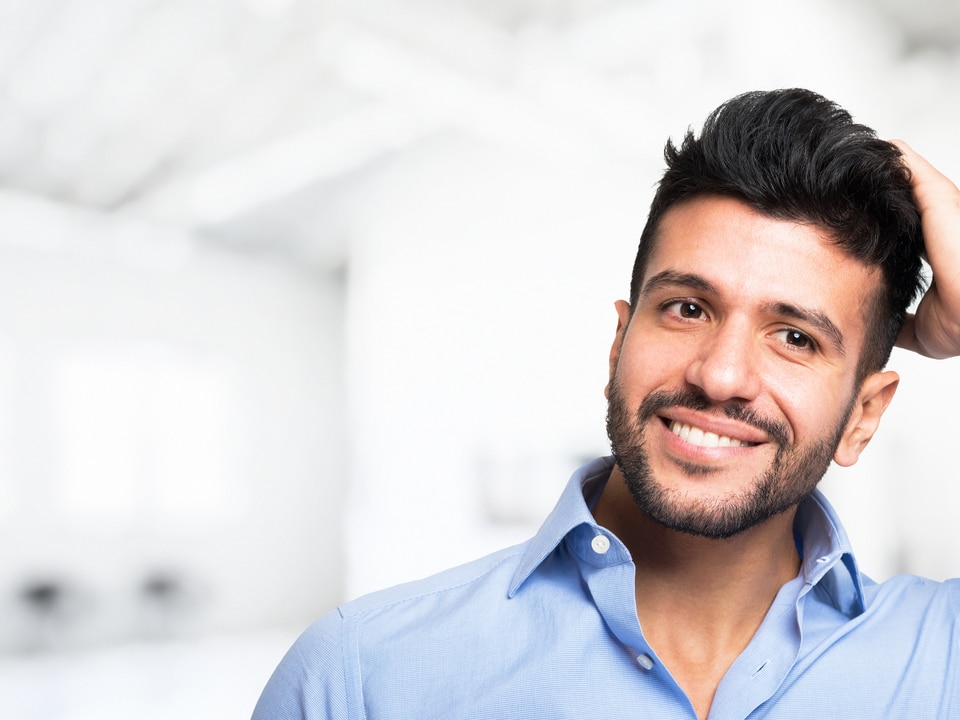 man happy with his hair growth