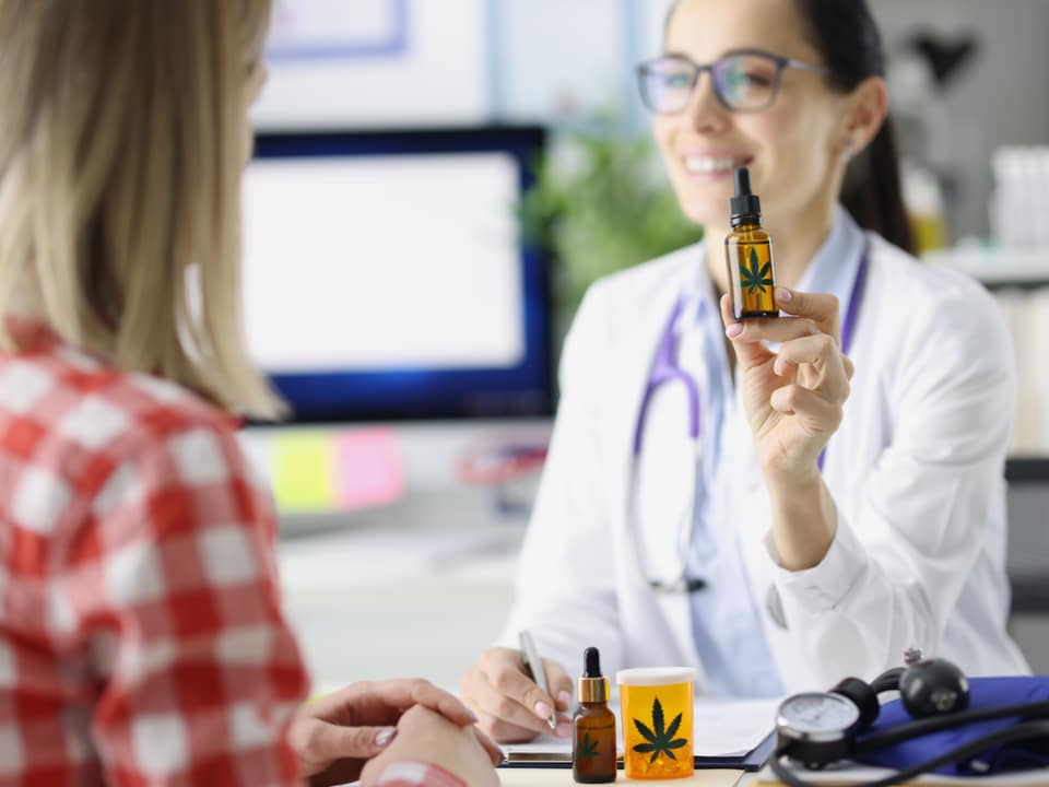 doctor showing cbd for the patient