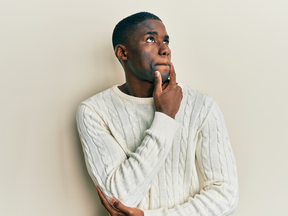 man thinking about how cbd oil can be used for tendonitis