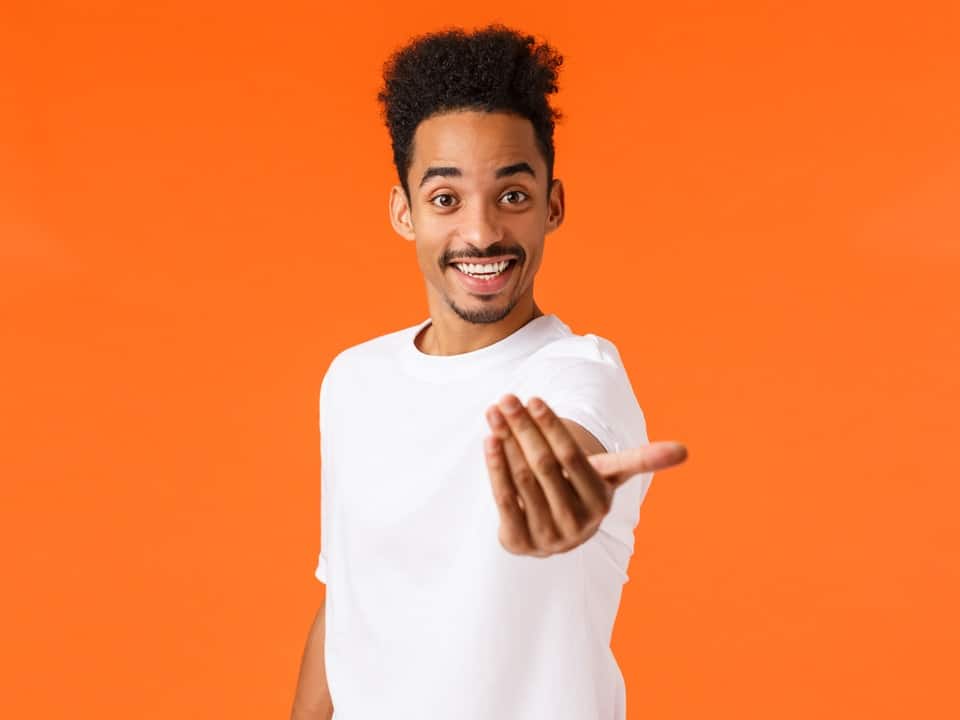 man encouraging people to come