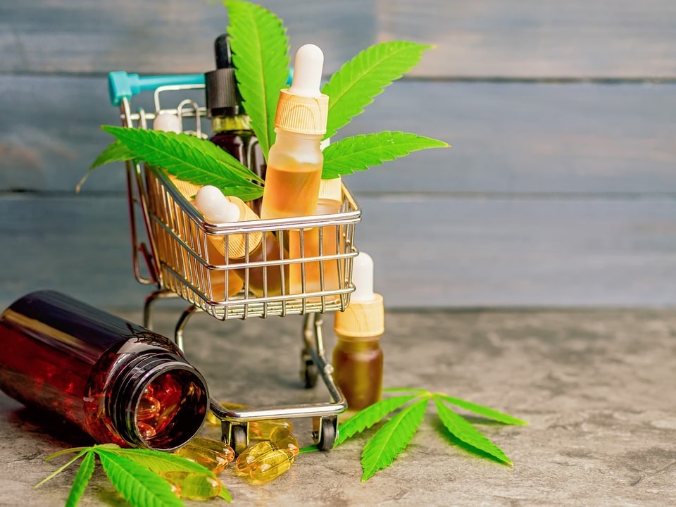 trolley with cbd tinctures and capsules