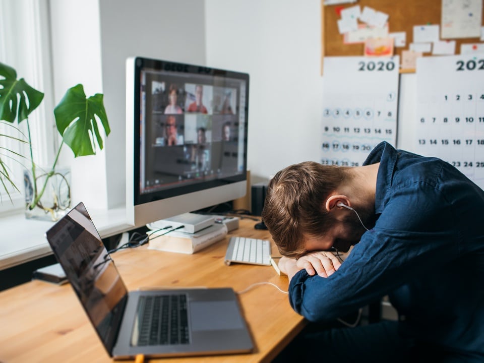office worker feeling fatigue in his desk