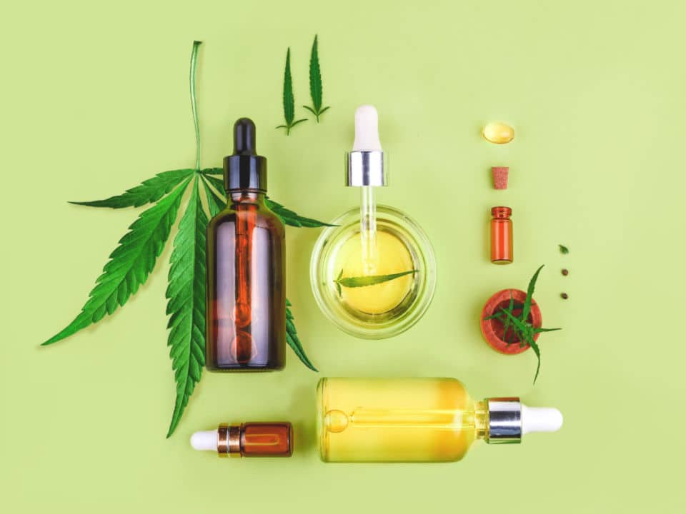 different types of cbd extract and cannabis leaves